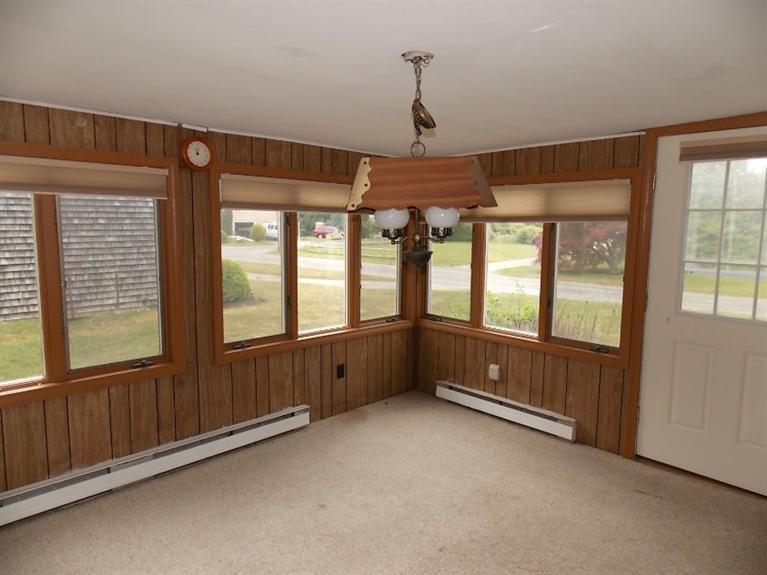 22 Iyanough Road Hyannis, MA 02601 - Photo 7 of 17 a view of an empty room with a window