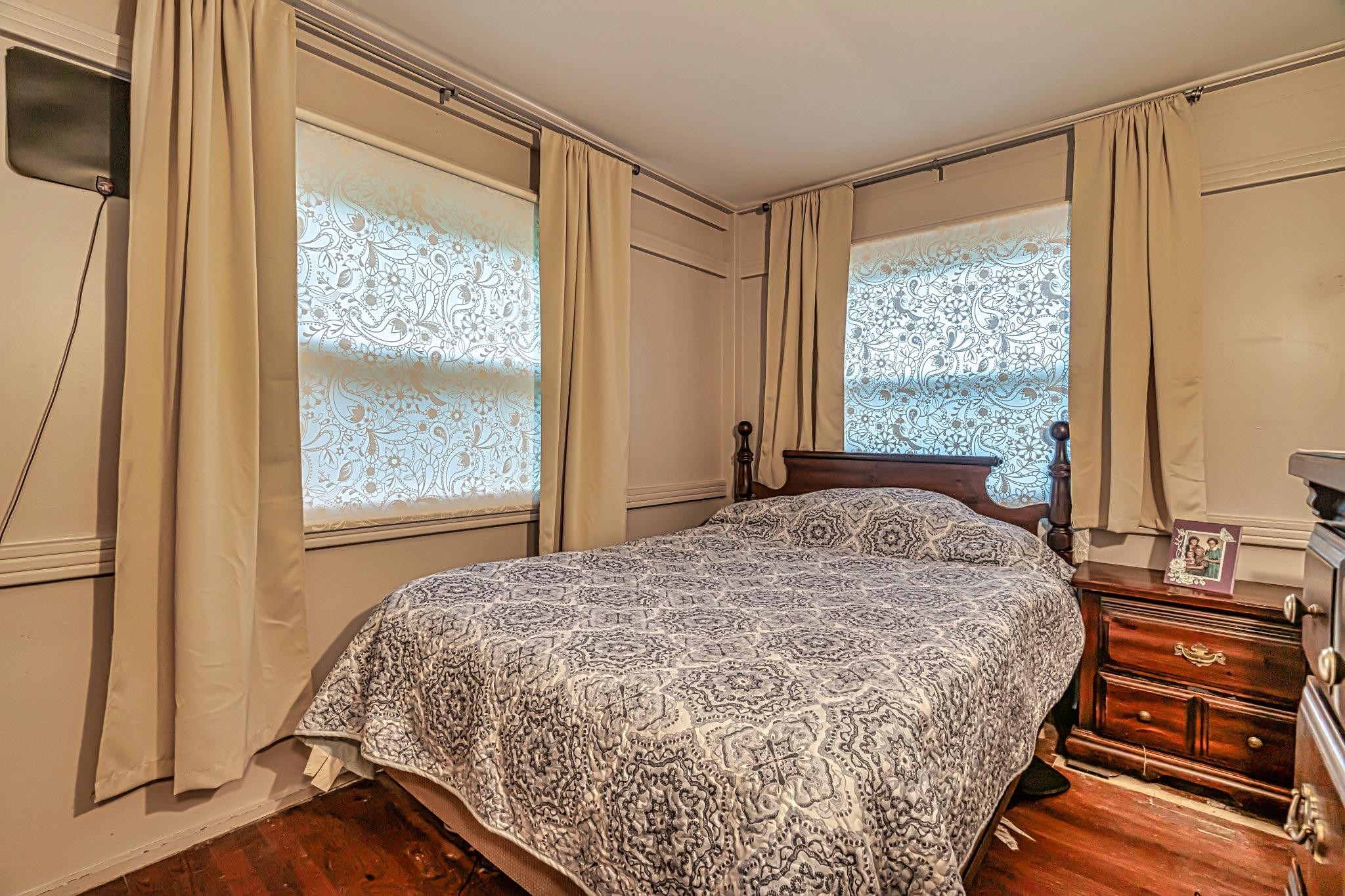 106 Tomlinson Road Oak Ridge, TN 37830 - Photo 14 of 21 a bedroom with a bed and next to a window
