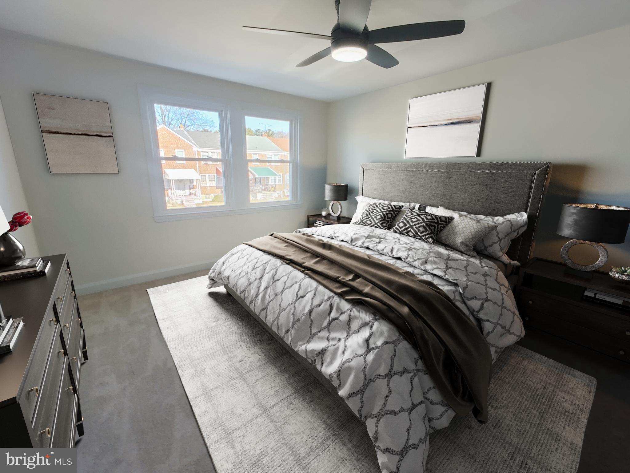 1525 Medford Road Baltimore, MD 21218 - Photo 22 of 39 a bedroom with double bed and a window