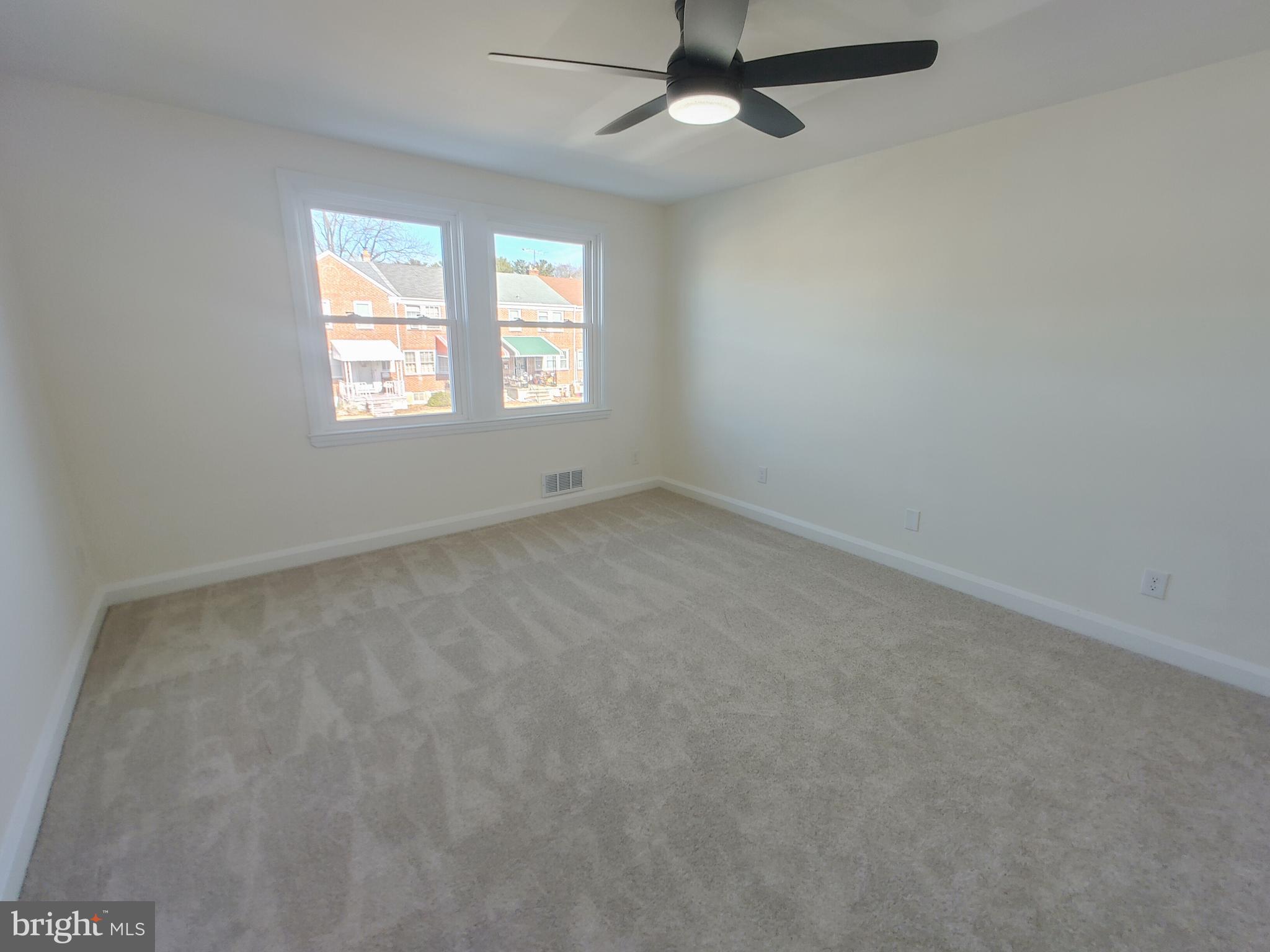 1525 Medford Road Baltimore, MD 21218 - Photo 23 of 39 an empty room with a window