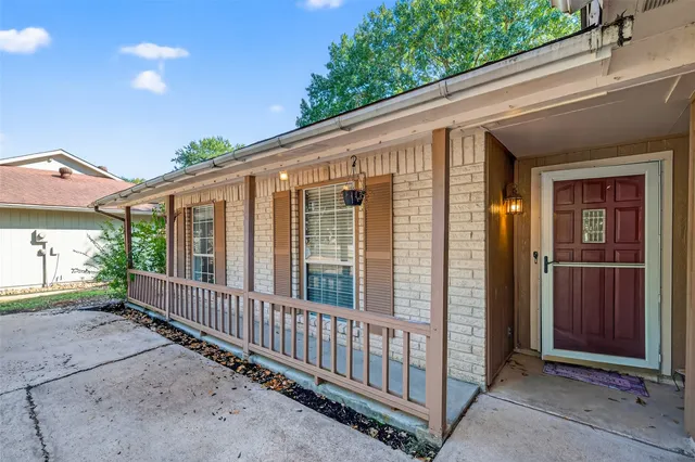 a porch with seating space