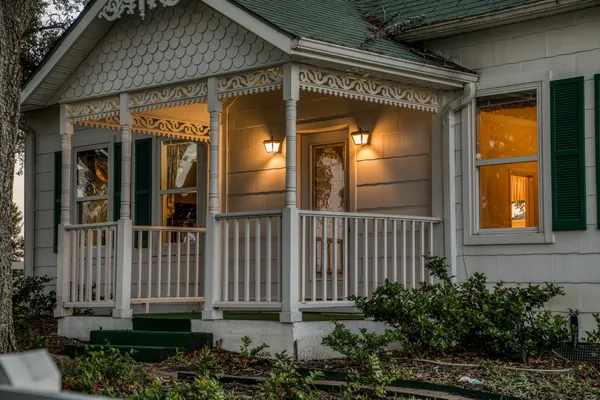a view of a house with a small porch