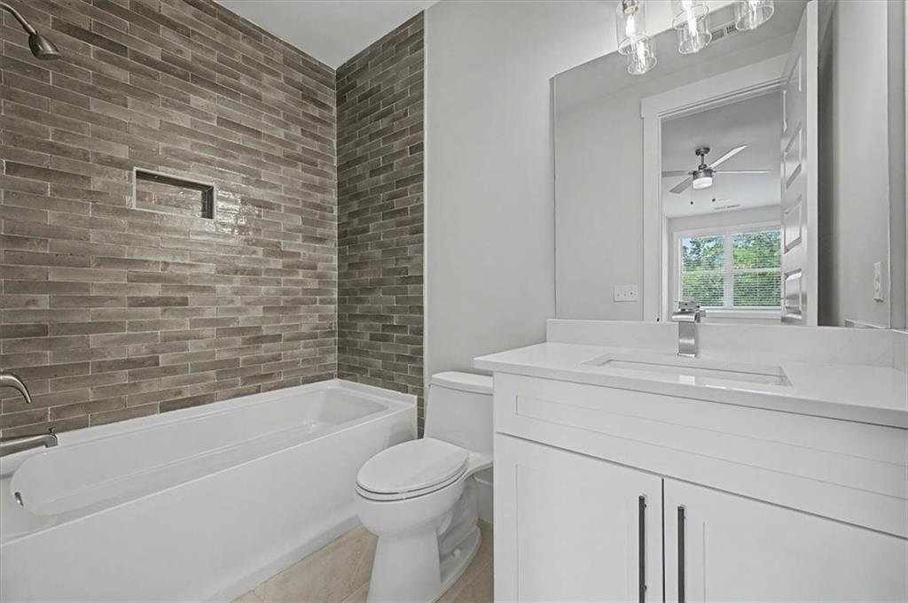 217 Laura Lake Road Marietta, GA 30066 - Photo 42 of 54 a bathroom with a sink a toilet and bathtub