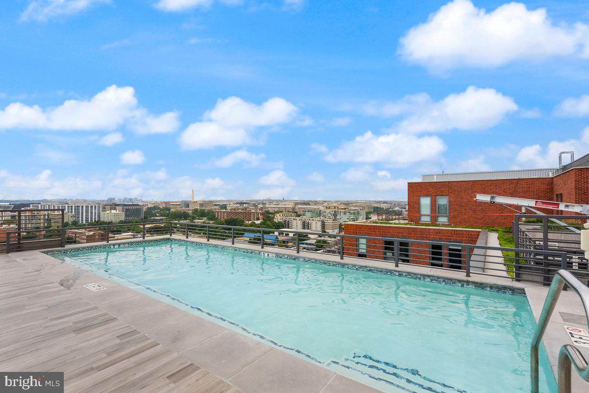 1211 Van Street Southeast, Unit PH13B Washington, DC 20003 - Photo 22 of 25 a view of a lake with a city