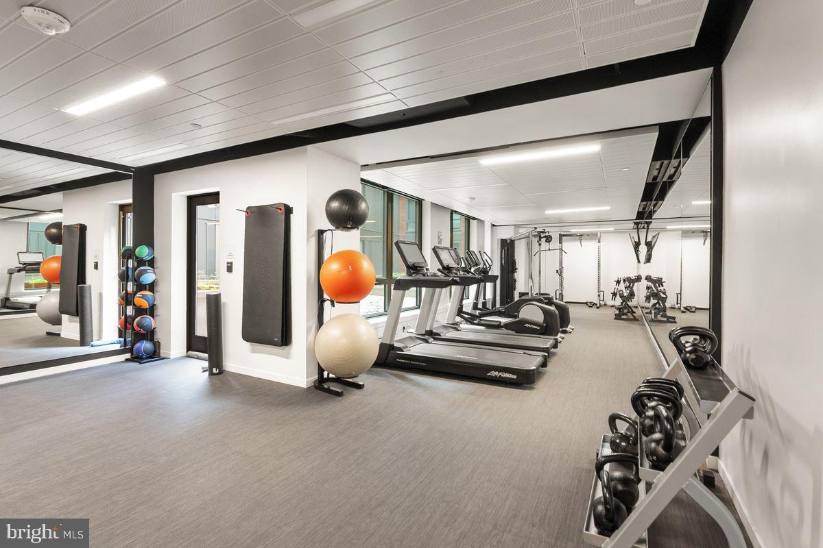 1211 Van Street Southeast, Unit PH13B Washington, DC 20003 - Photo 23 of 25 a view of a room with gym equipment