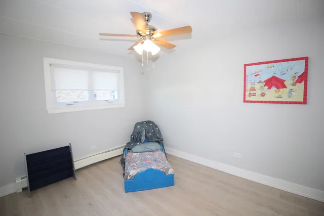 a room with gym equipment and a window