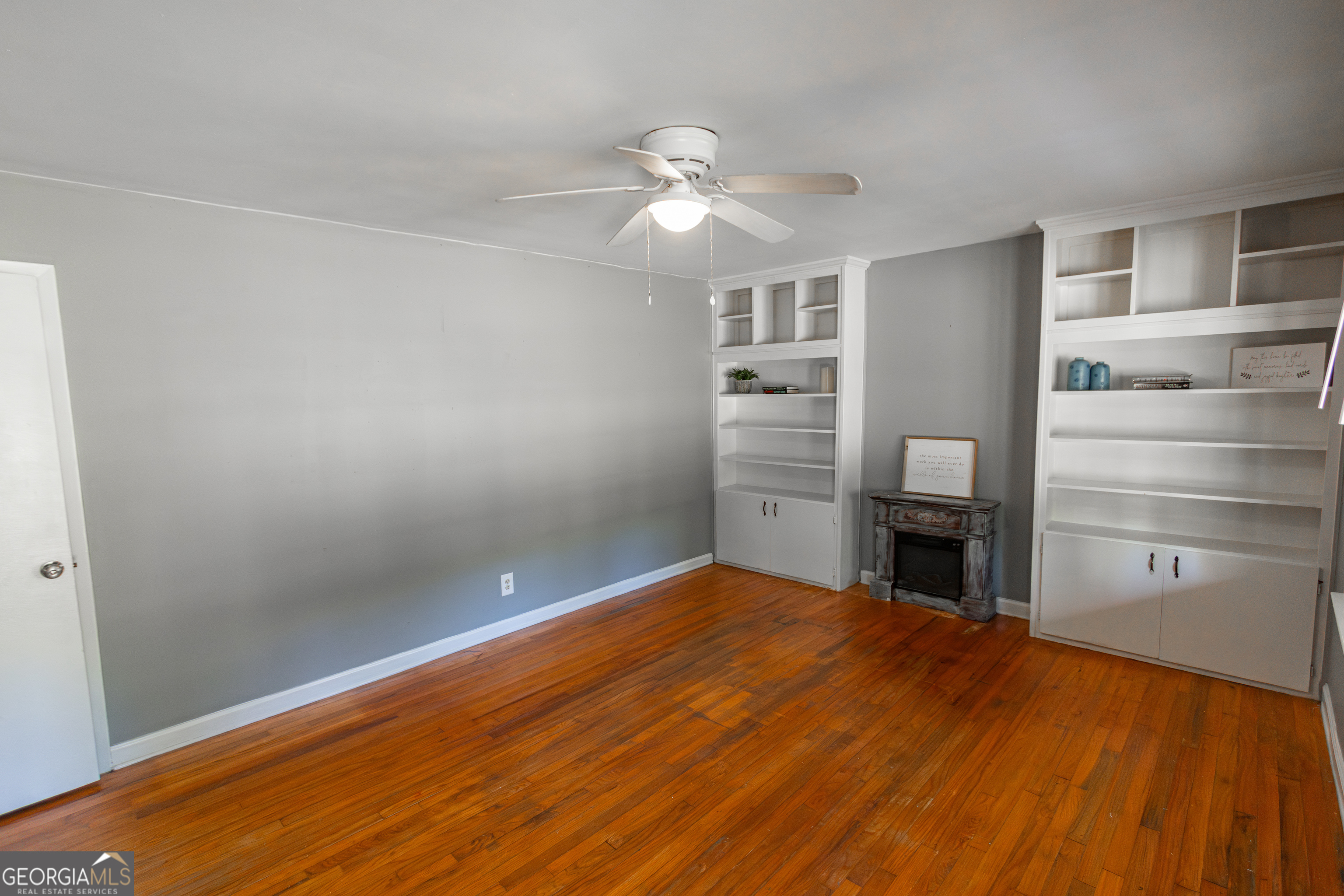 208 Bassett Street Centerville, GA 31028 - Photo 8 of 24 a kitchen with a refrigerator and ceiling fan