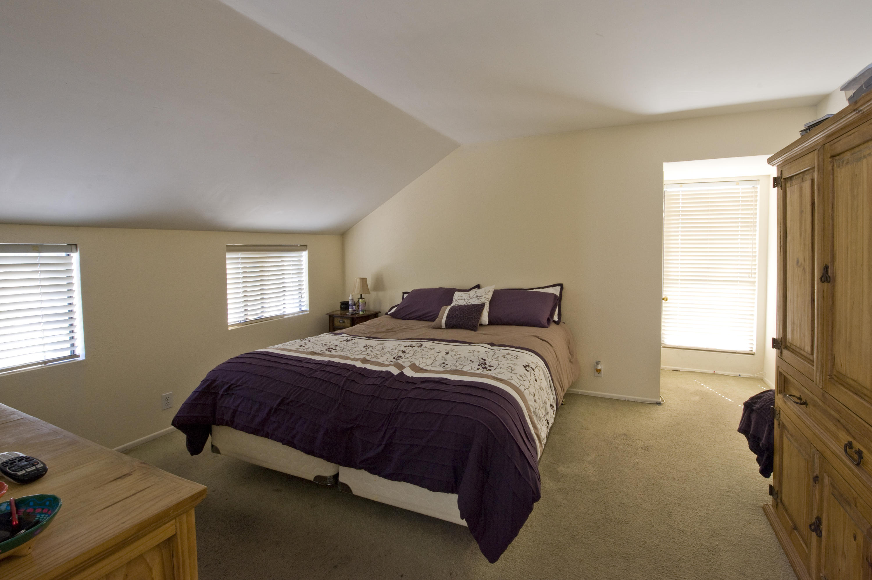 3558 Modoc Road, Unit 37 Santa Barbara, CA 93105 - Photo 6 of 12 a bedroom with a bed and a window