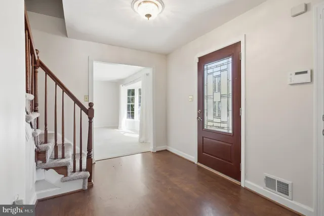 an entryway with a workspace