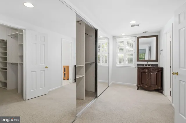 a view of a kitchen with furniture and a window