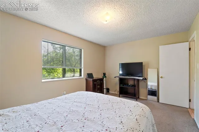 a view of a room with a hallway