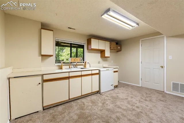 a bedroom with furniture and a chandelier