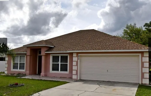a front view of house with yard