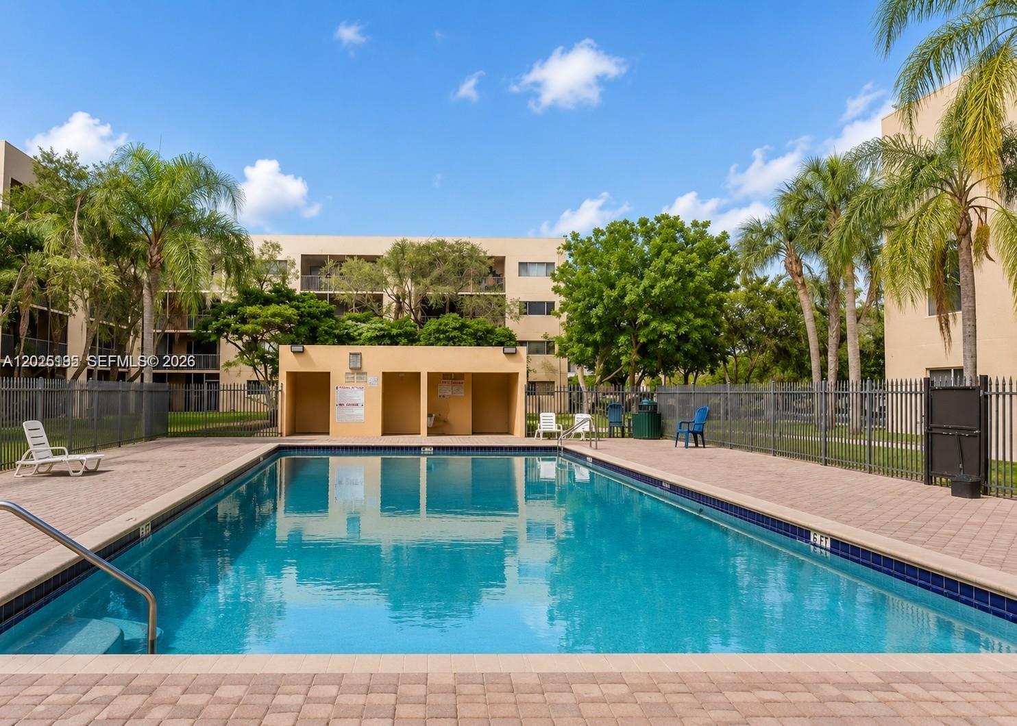 8400 Southwest 133rd Avenue Road, Unit 121 Miami, FL 33183 - Photo 12 of 43 a view of a house with pool