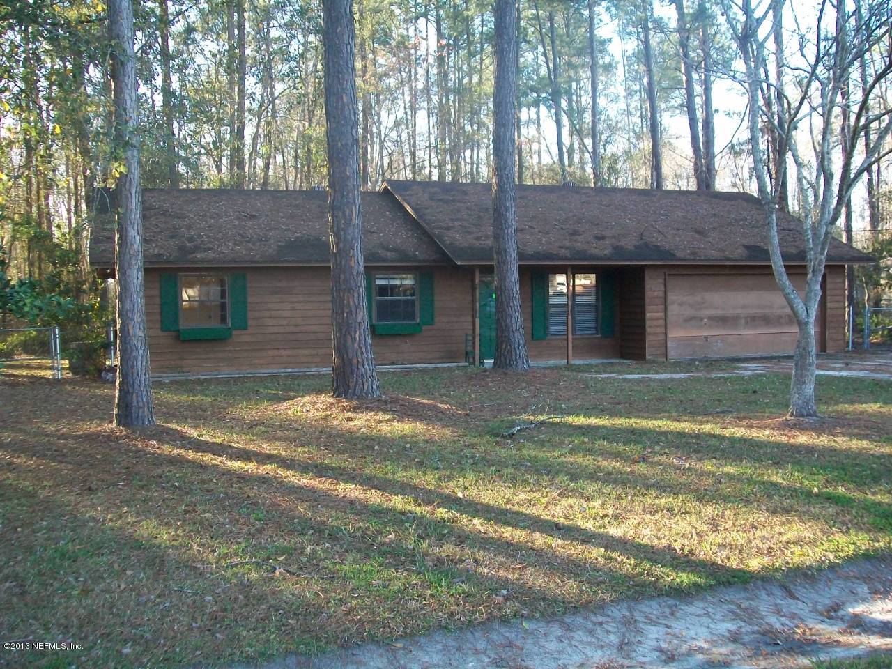 54327 Vikki Road Callahan, FL 32011 - Photo 1 of 3 a view of a house with a yard