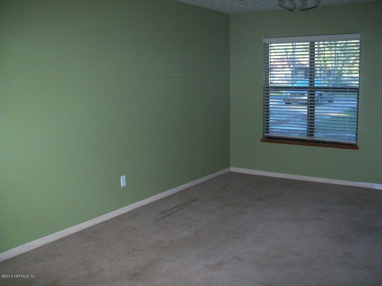 54327 Vikki Road Callahan, FL 32011 - Photo 3 of 3 an empty room with a window