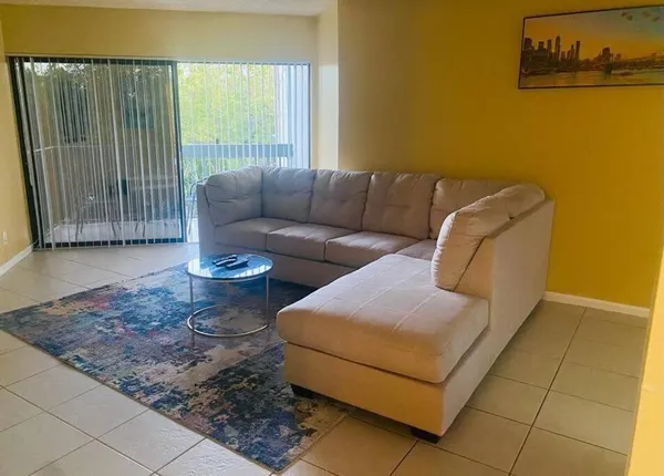 a view of a livingroom with furniture