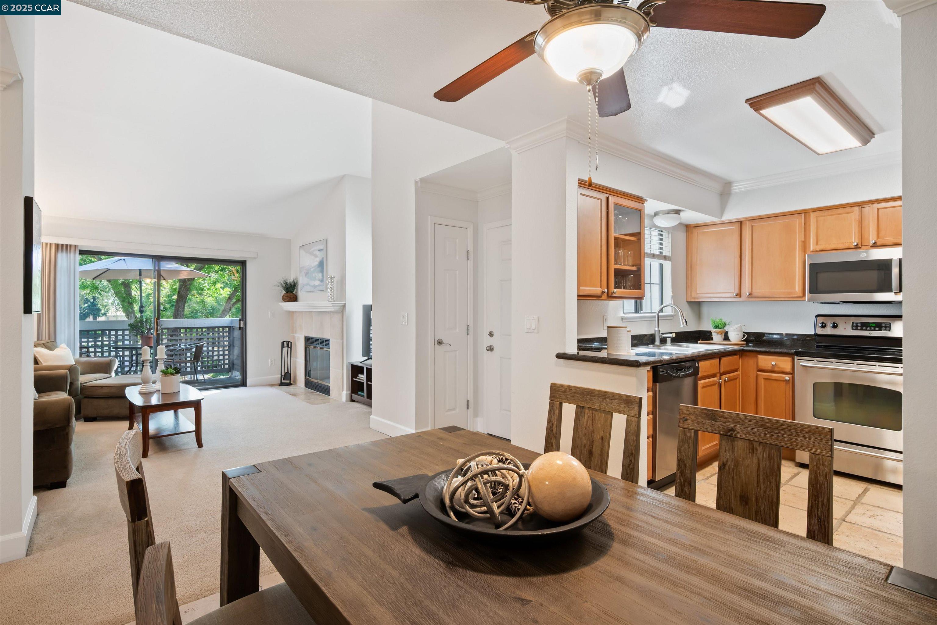 332 Eastridge Drive San Ramon, CA 94582 - Photo 14 of 36 a living room with stainless steel appliances furniture and a wooden floor