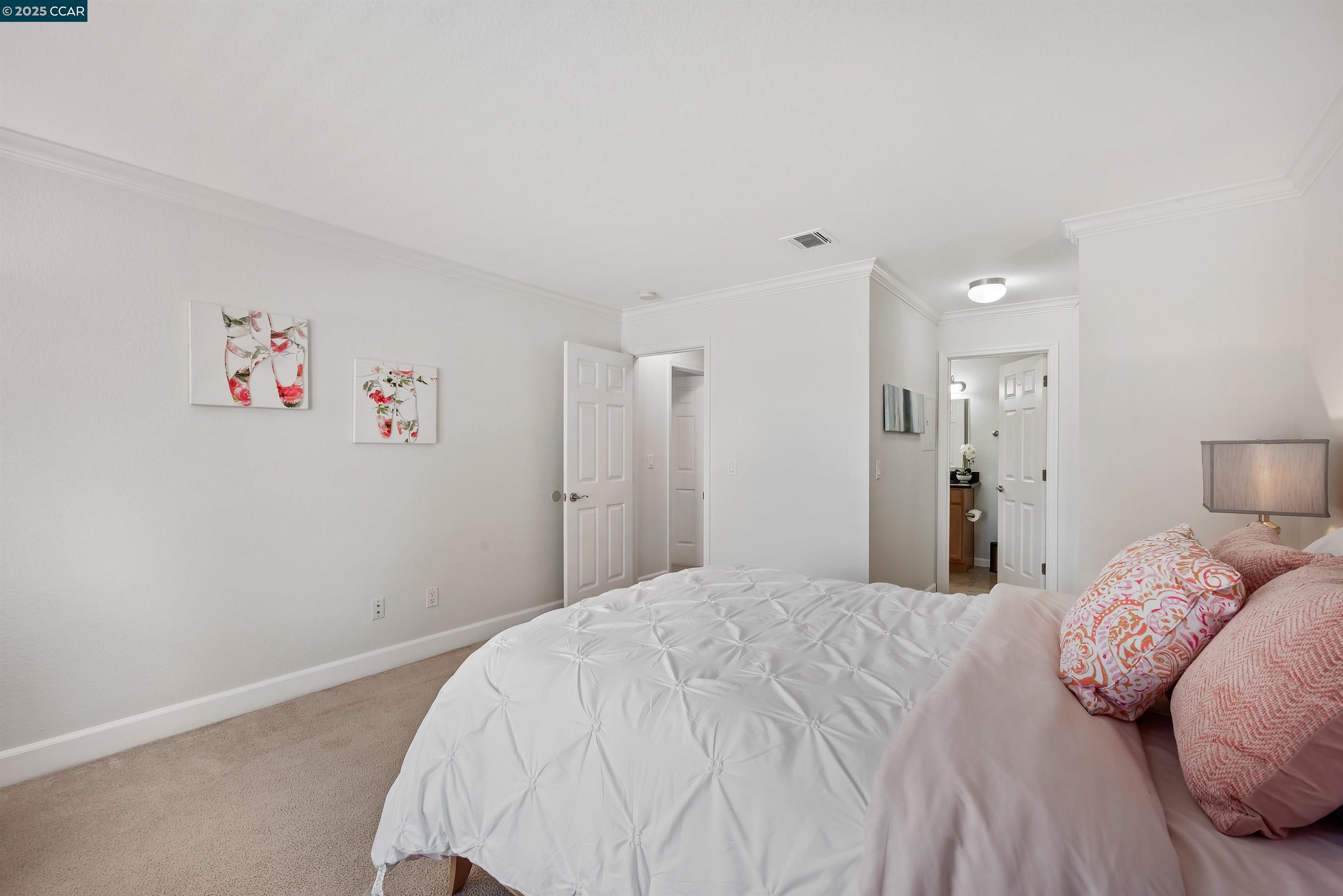 332 Eastridge Drive San Ramon, CA 94582 - Photo 25 of 36 a bedroom with a bed and a painting on the wall