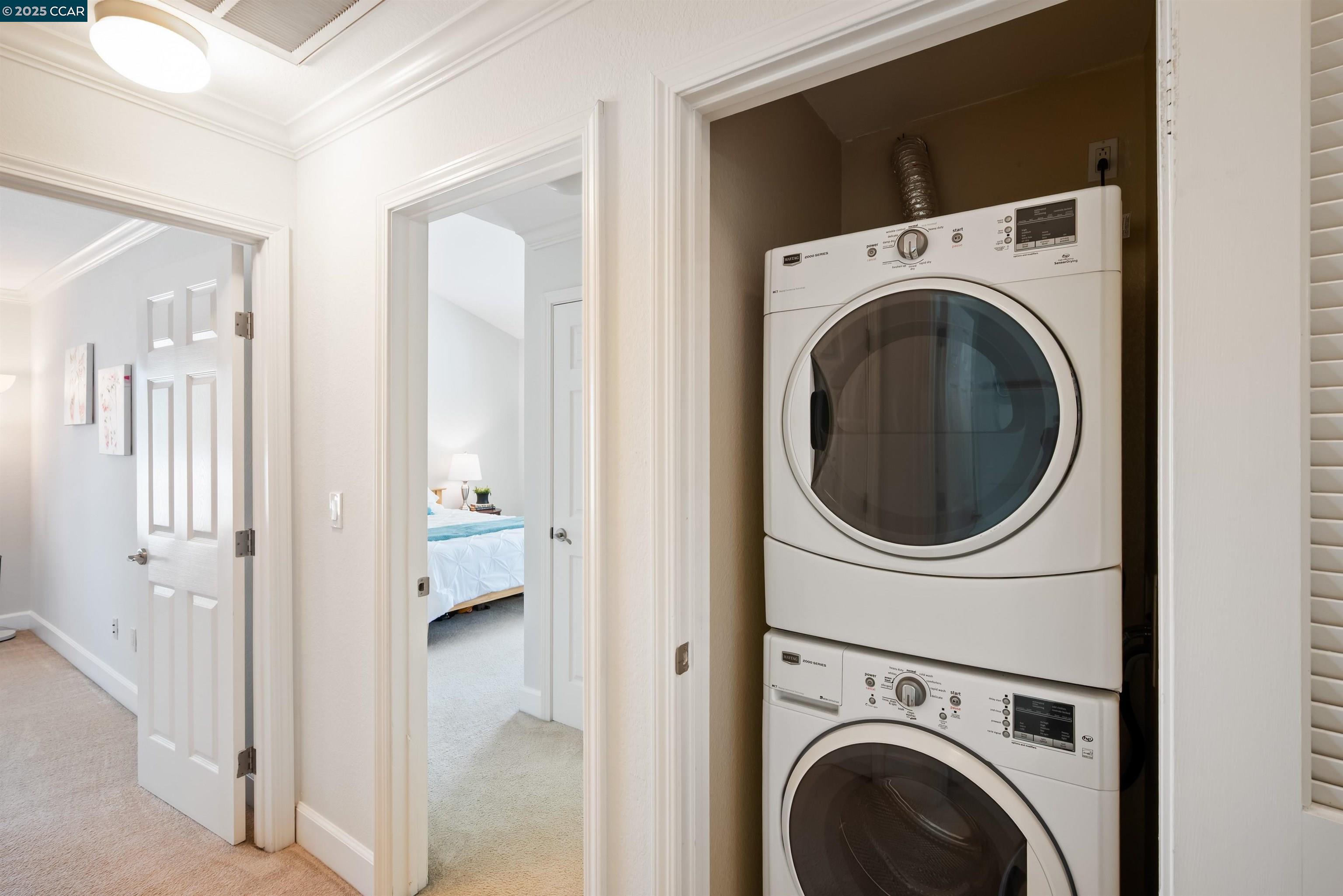 332 Eastridge Drive San Ramon, CA 94582 - Photo 27 of 36 a view of a hallway with washer and dryer