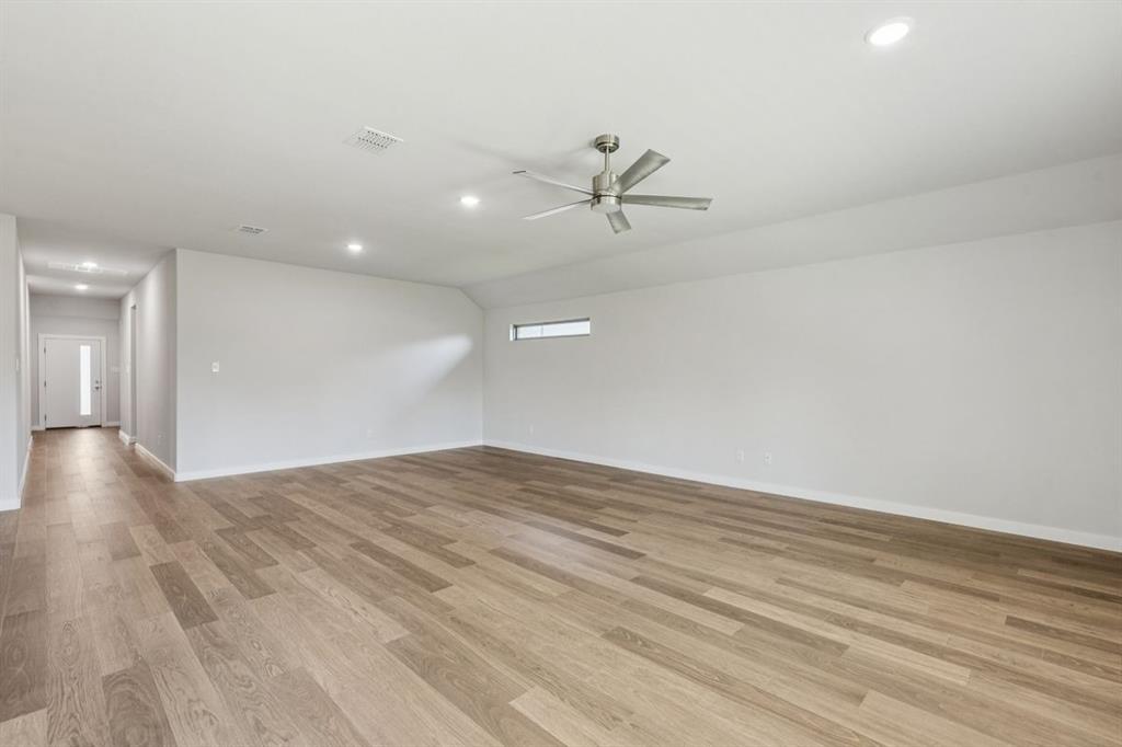 361 Yellowstar Lane Lavon, TX 75166 - Photo 10 of 33 Living and Dining Rooms in the Oscar home plan by Trophy Signature Homes – REPRESENTATIVE PHOTO