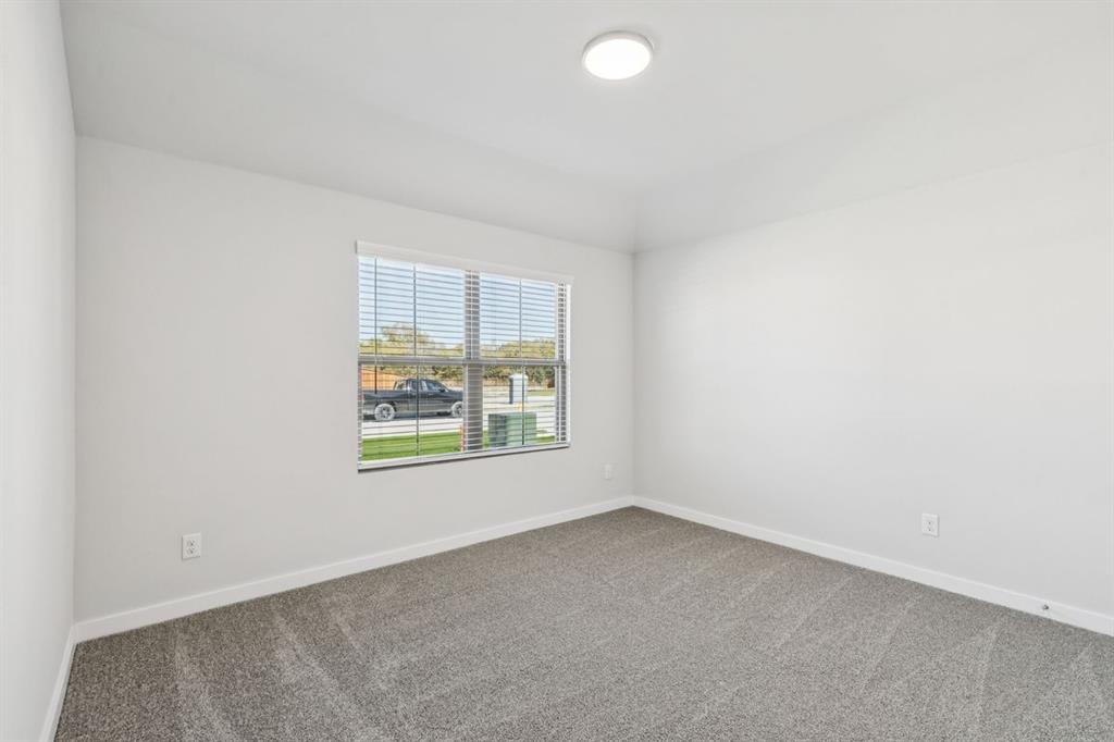 361 Yellowstar Lane Lavon, TX 75166 - Photo 20 of 33 Bedroom in the Oscar home plan by Trophy Signature Homes – REPRESENTATIVE PHOTO