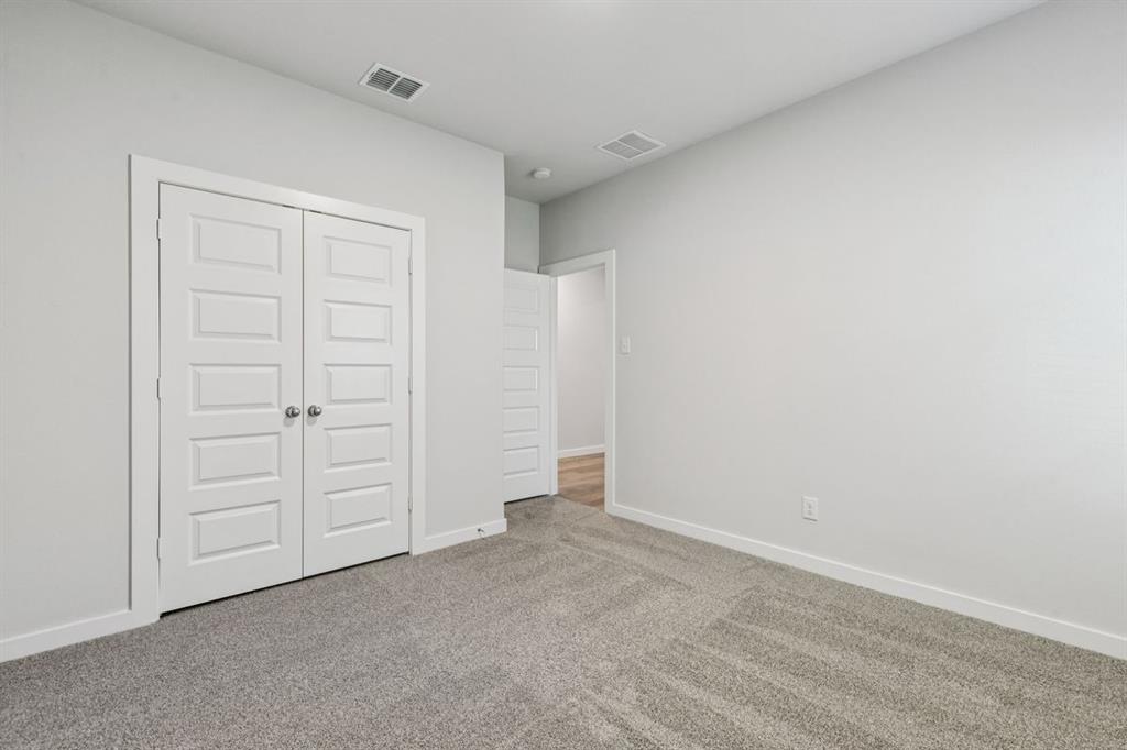 361 Yellowstar Lane Lavon, TX 75166 - Photo 23 of 33 Bedroom in the Oscar home plan by Trophy Signature Homes – REPRESENTATIVE PHOTO