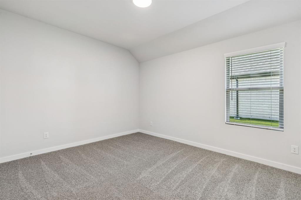 361 Yellowstar Lane Lavon, TX 75166 - Photo 24 of 33 Bedroom in the Oscar home plan by Trophy Signature Homes – REPRESENTATIVE PHOTO