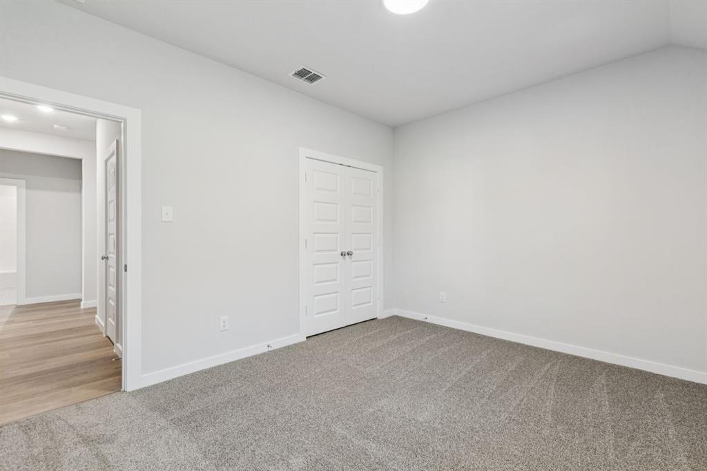 361 Yellowstar Lane Lavon, TX 75166 - Photo 25 of 33 Bedroom in the Oscar home plan by Trophy Signature Homes – REPRESENTATIVE PHOTO