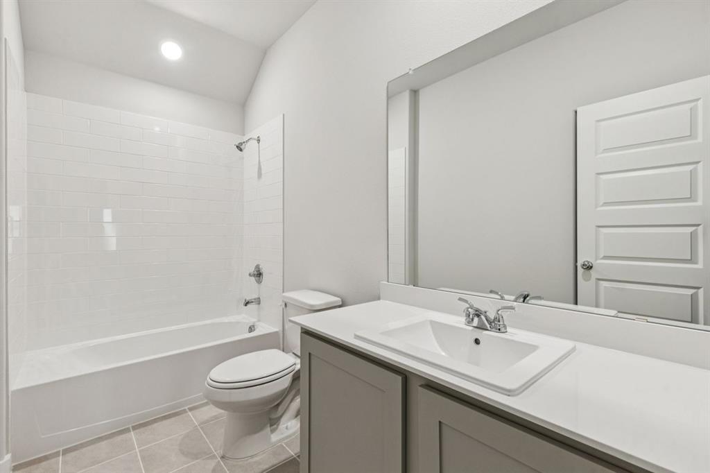 361 Yellowstar Lane Lavon, TX 75166 - Photo 26 of 33 Bathroom in the Oscar home plan by Trophy Signature Homes – REPRESENTATIVE PHOTO