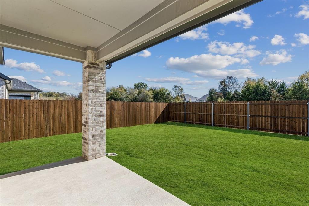 361 Yellowstar Lane Lavon, TX 75166 - Photo 28 of 33 Covered Patio in the Oscar home plan by Trophy Signature Homes – REPRESENTATIVE PHOTO