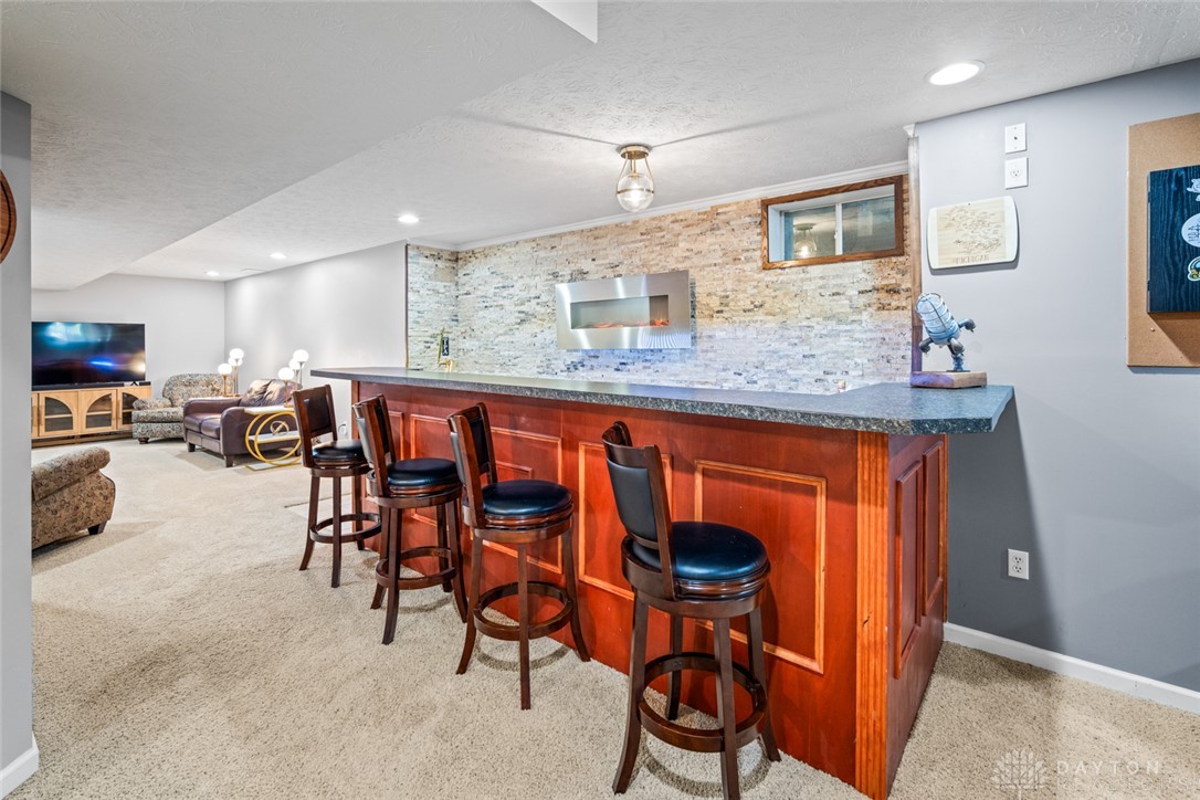 55 Janney Lane Springboro, OH 45066 - Photo 32 of 38 This versatile basement offers a dynamic space for relaxation and entertainment.