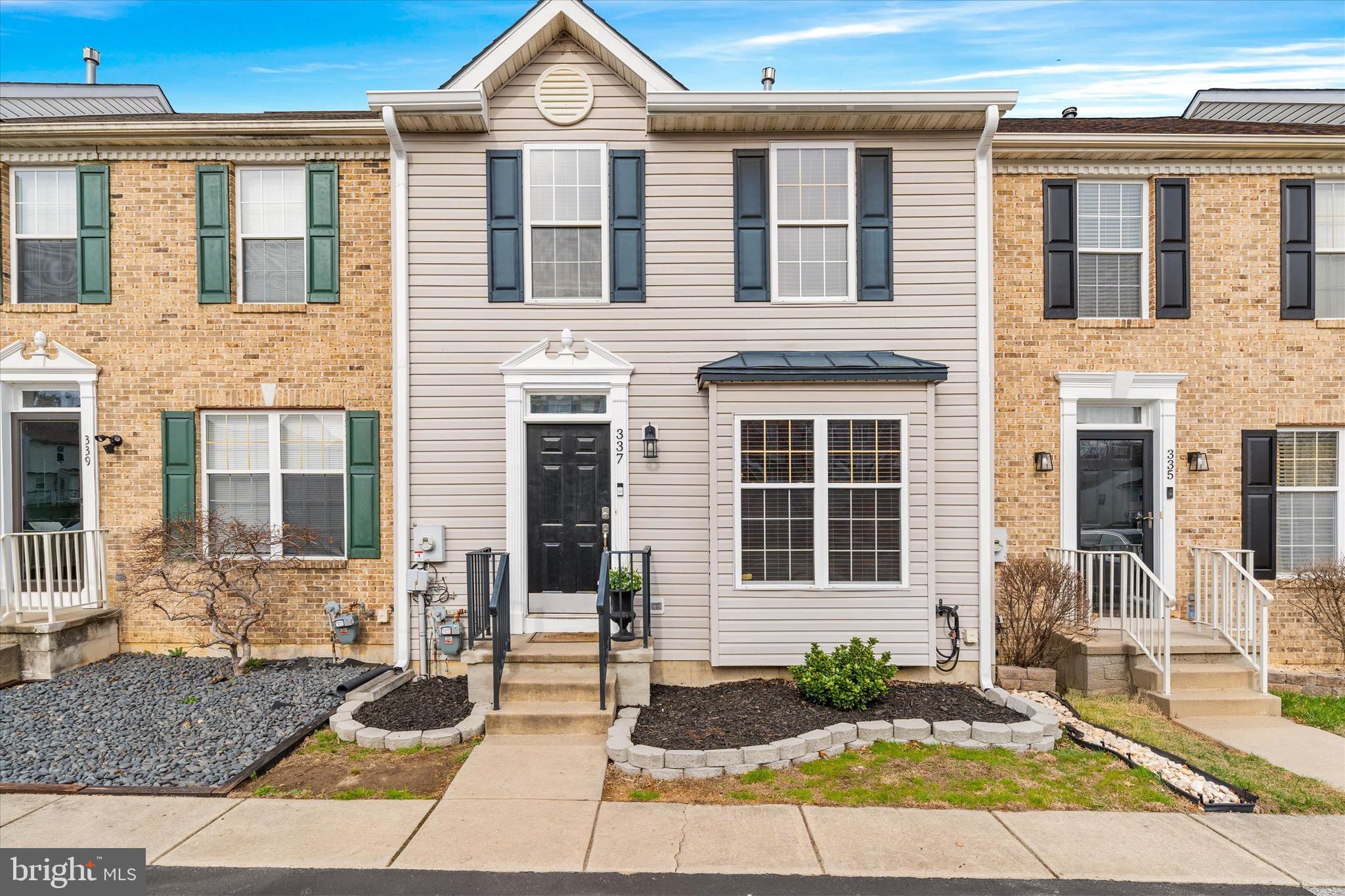 337 Norman Drive Newark, DE 19702 - Photo 1 of 33 a front view of a house with a yard