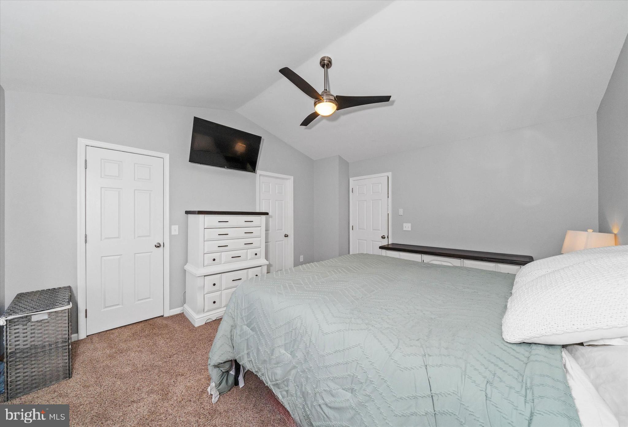 337 Norman Drive Newark, DE 19702 - Photo 17 of 33 a bedroom with a bed and a flat screen tv