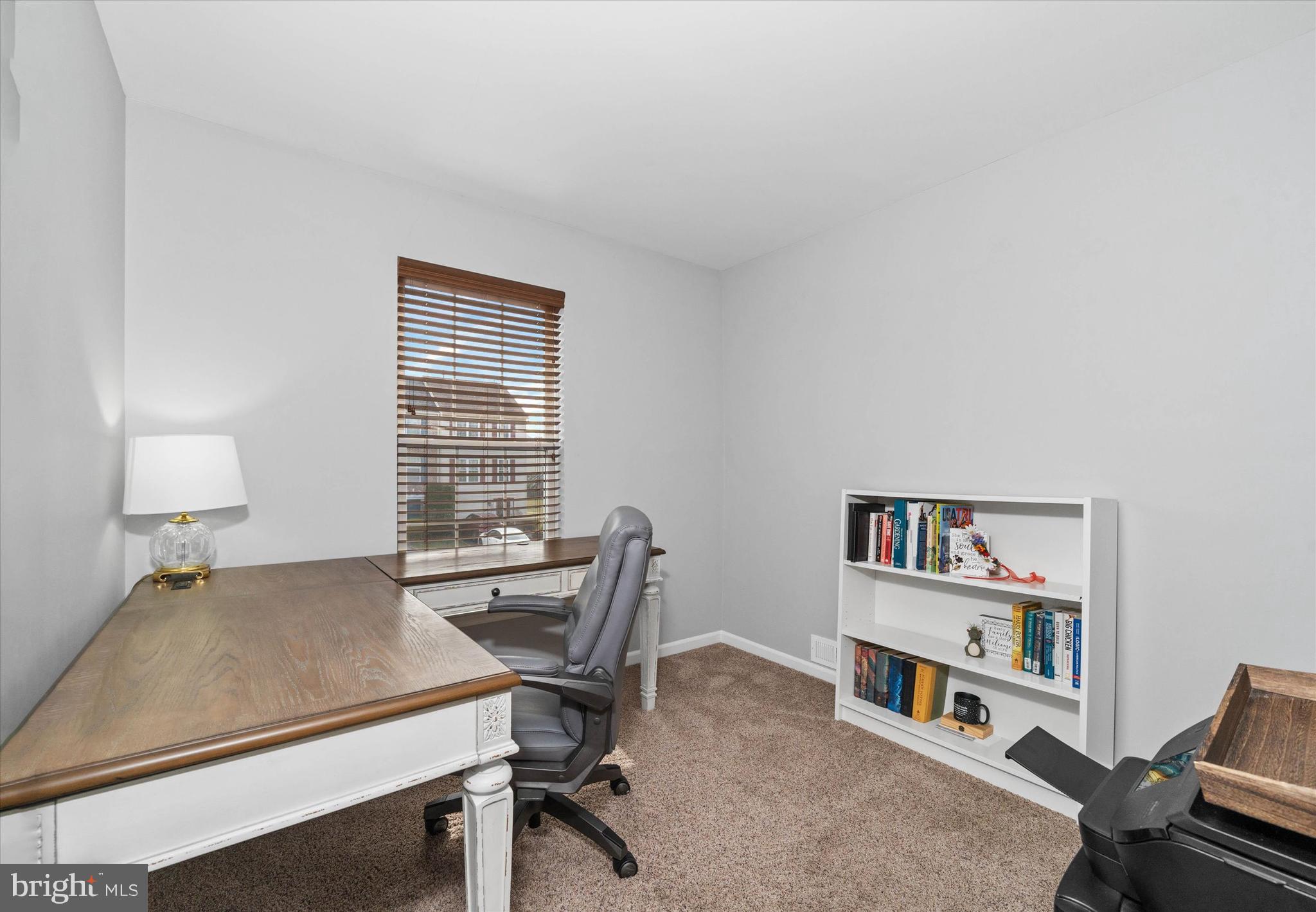 337 Norman Drive Newark, DE 19702 - Photo 21 of 33 a workspace with furniture and a bookshelf
