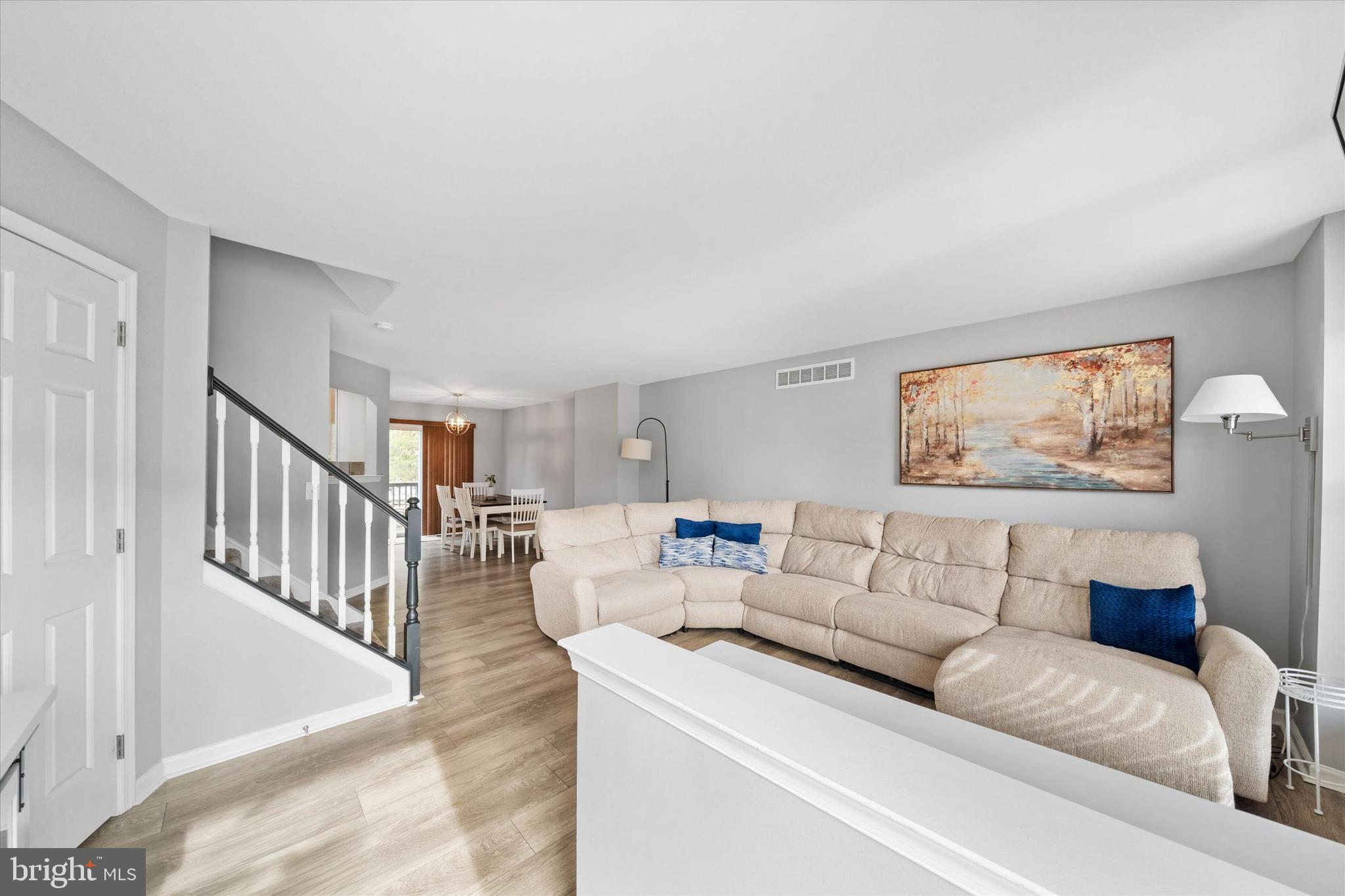 337 Norman Drive Newark, DE 19702 - Photo 4 of 33 a living room with furniture and a wooden floor