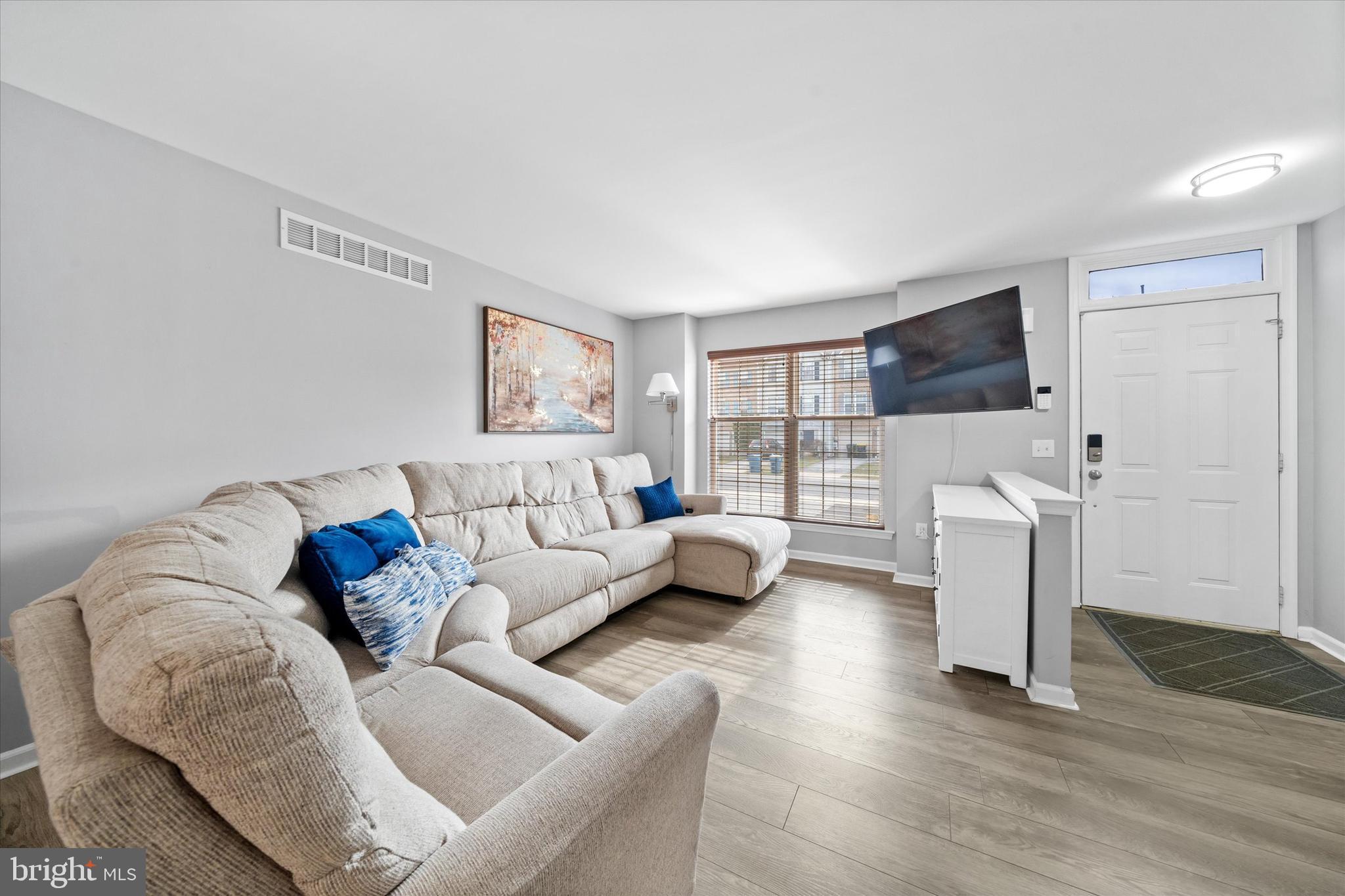 337 Norman Drive Newark, DE 19702 - Photo 5 of 33 a living room with furniture and a flat screen tv