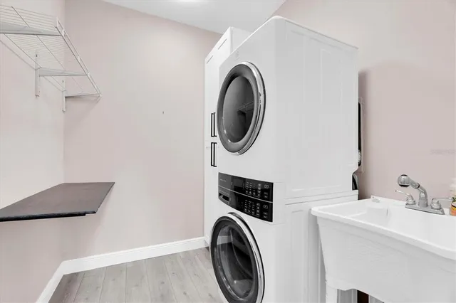 a view of a balcony with wooden floor