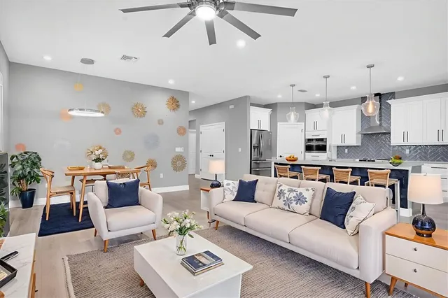 a view of kitchen with sink and wooden floor