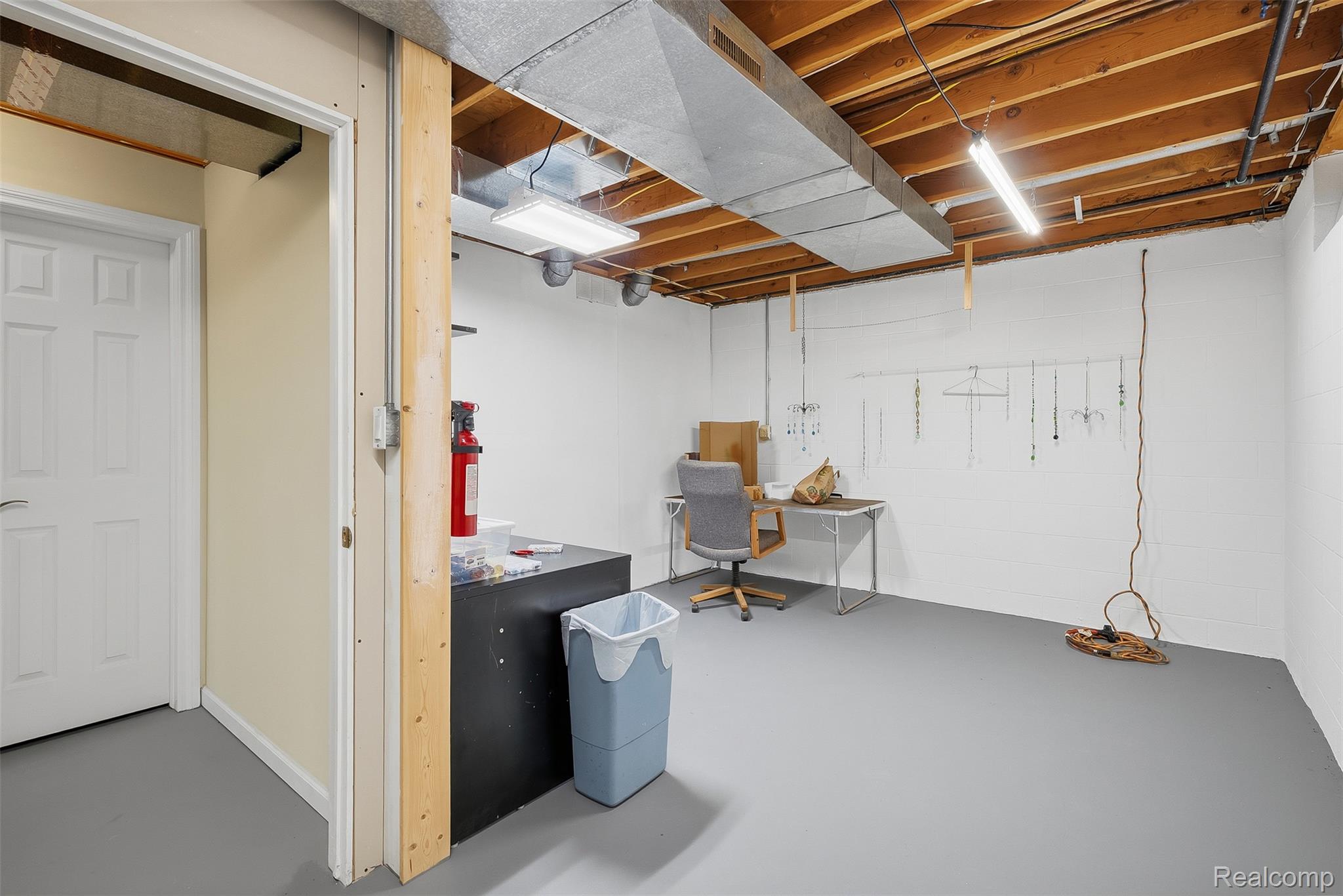 13182 Gilbert Road Memphis, MI 48041 - Photo 30 of 48 Spacious unfinished basement with exposed wood joists, utility piping, ductwork, and white walls