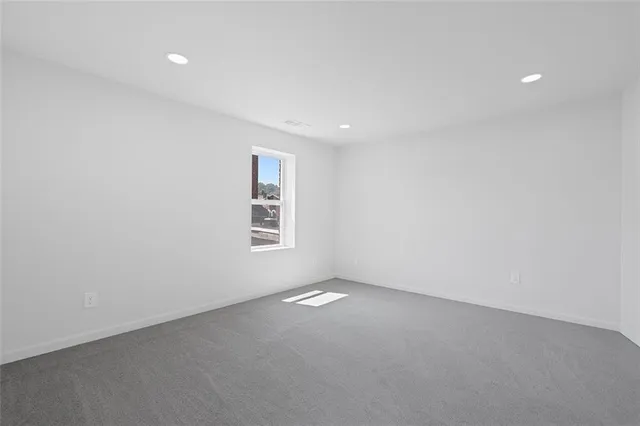 a view of room with white walls