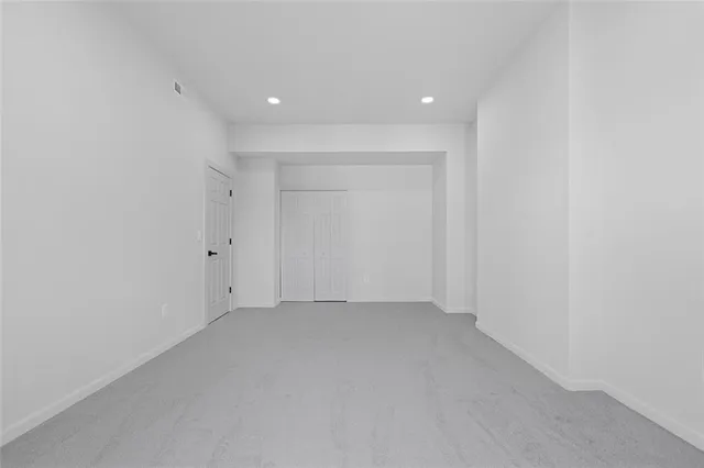 a view of a livingroom with stairs