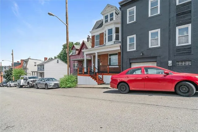 a car parked in front of a building