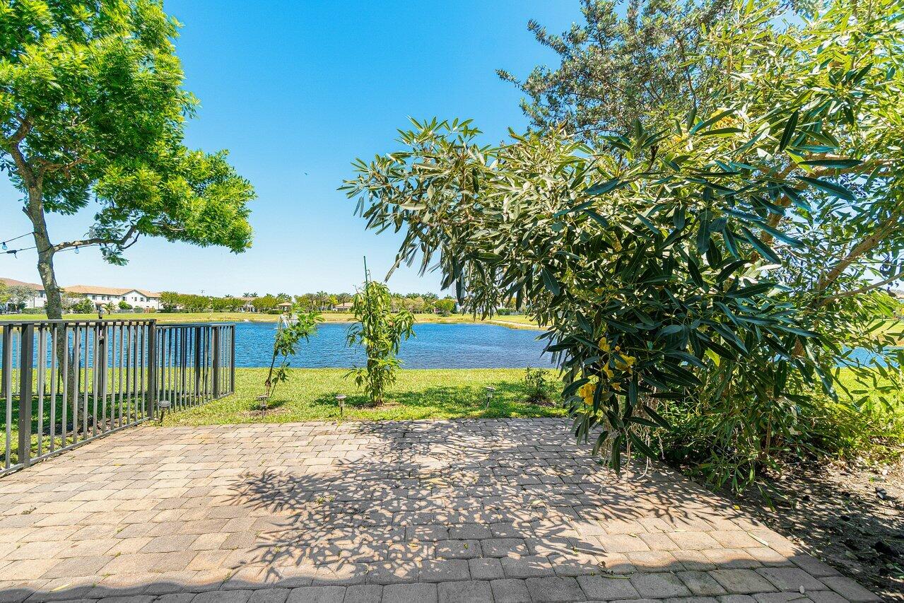 12949 Anthorne Lane Boynton Beach, FL 33436 - Photo 33 of 37 a view of a park with plants and large trees