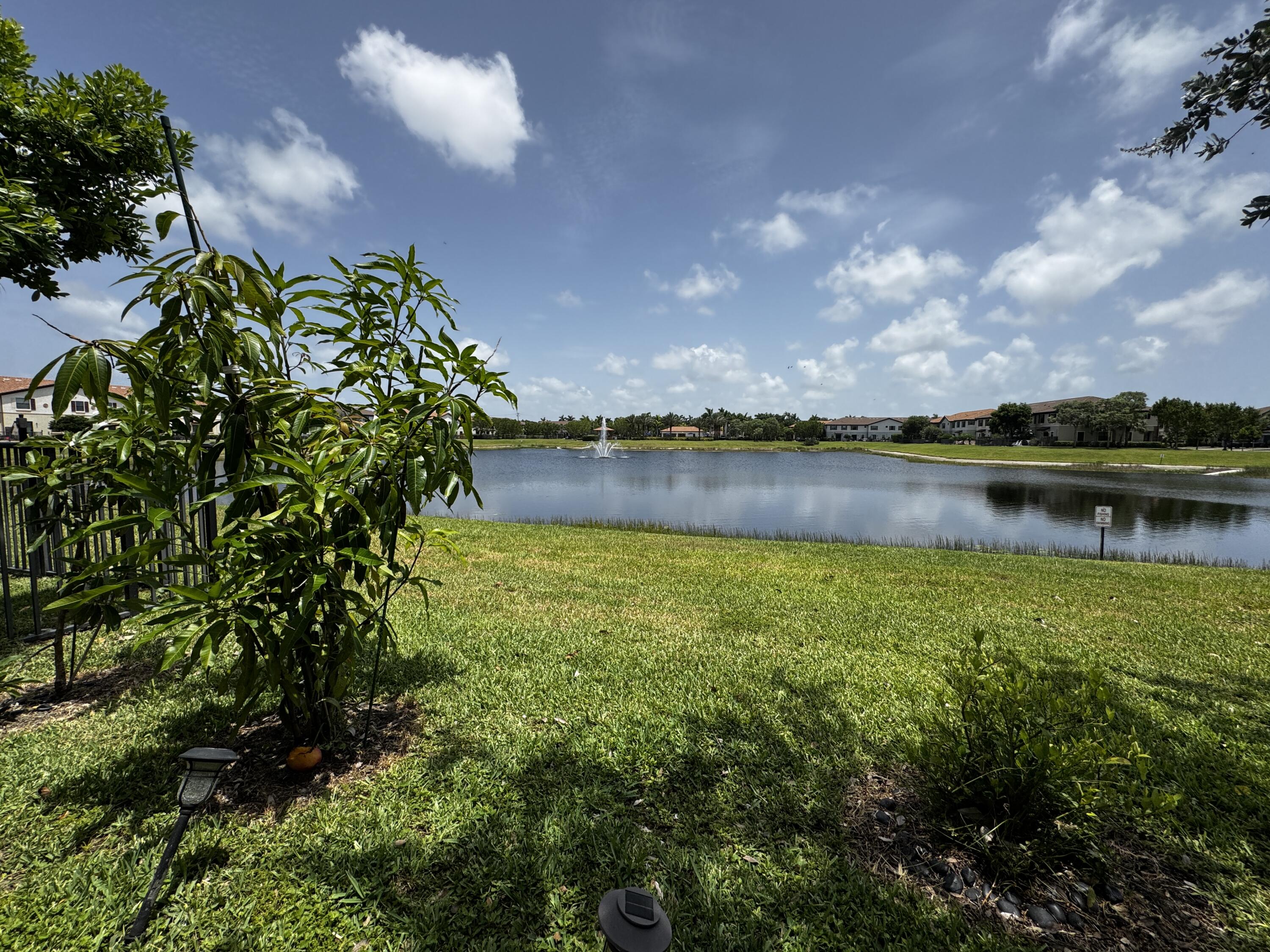 12949 Anthorne Lane Boynton Beach, FL 33436 - Photo 36 of 37 a view of a lake with a city