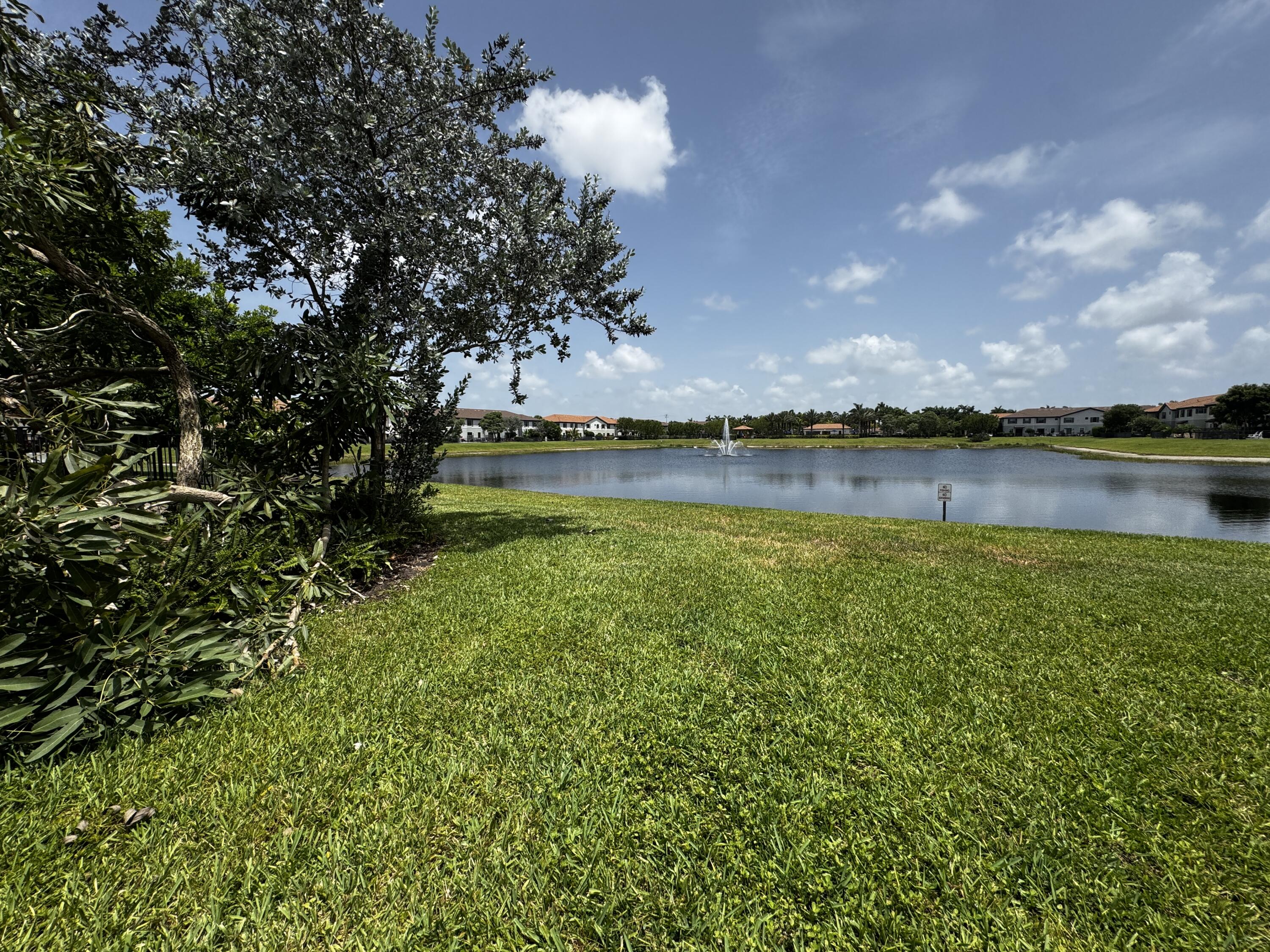 12949 Anthorne Lane Boynton Beach, FL 33436 - Photo 37 of 37 a view of a lake with a big yard