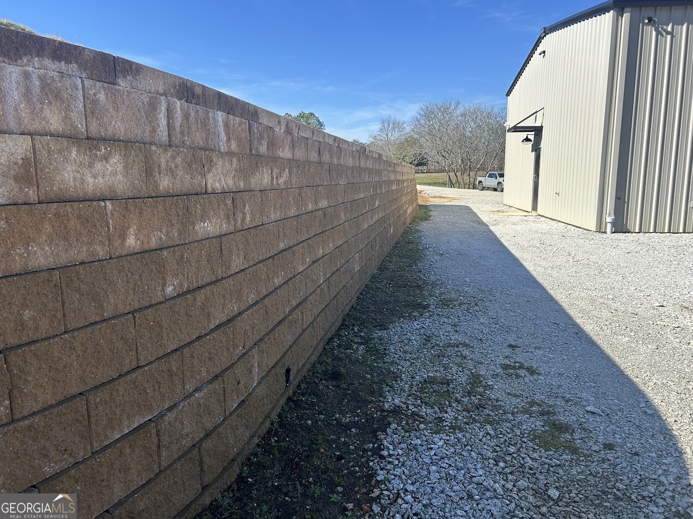85 Blackjack Mountain Road Bowdon, GA 30108 - Photo 11 of 32 a view of a pathway with a wooden fence