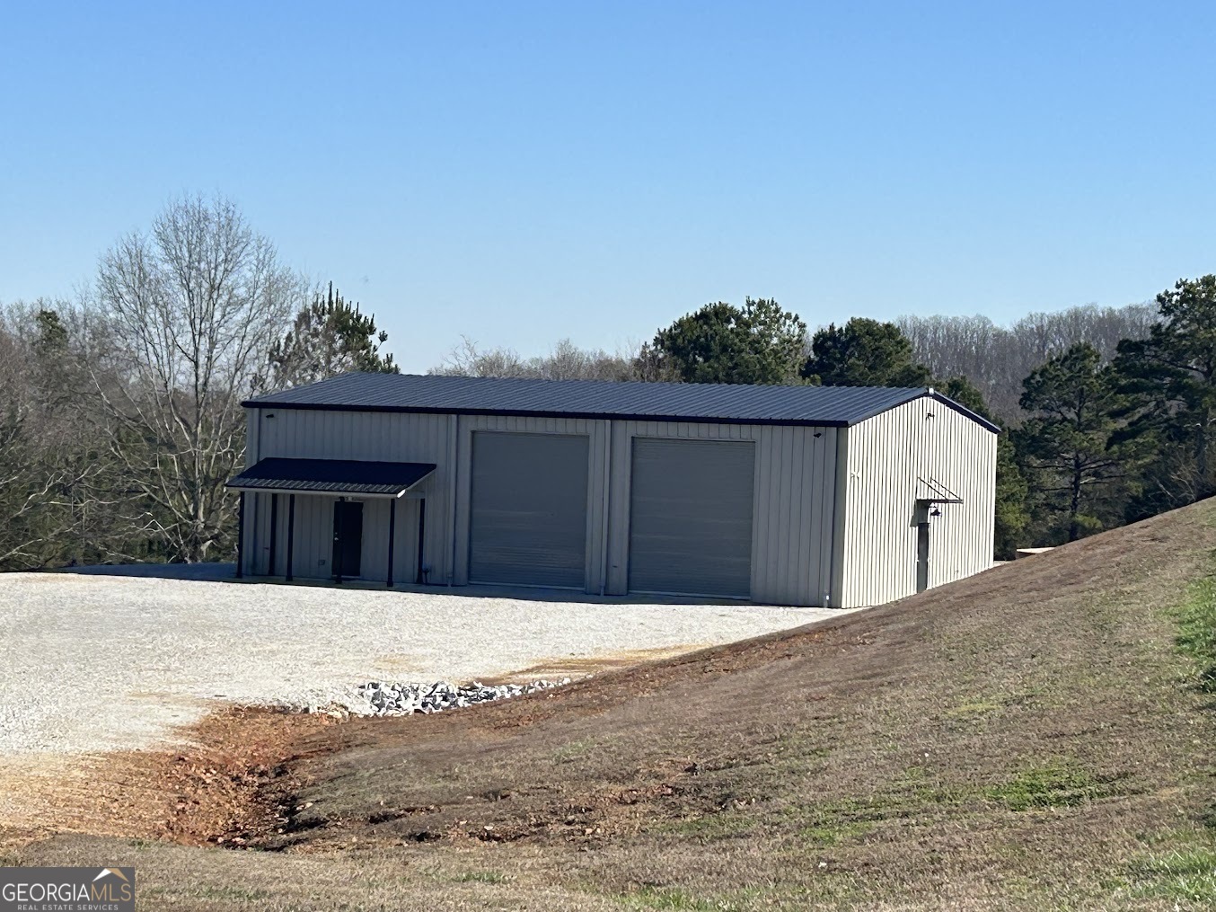 85 Blackjack Mountain Road Bowdon, GA 30108 - Photo 22 of 32 a front view of a house with a yard