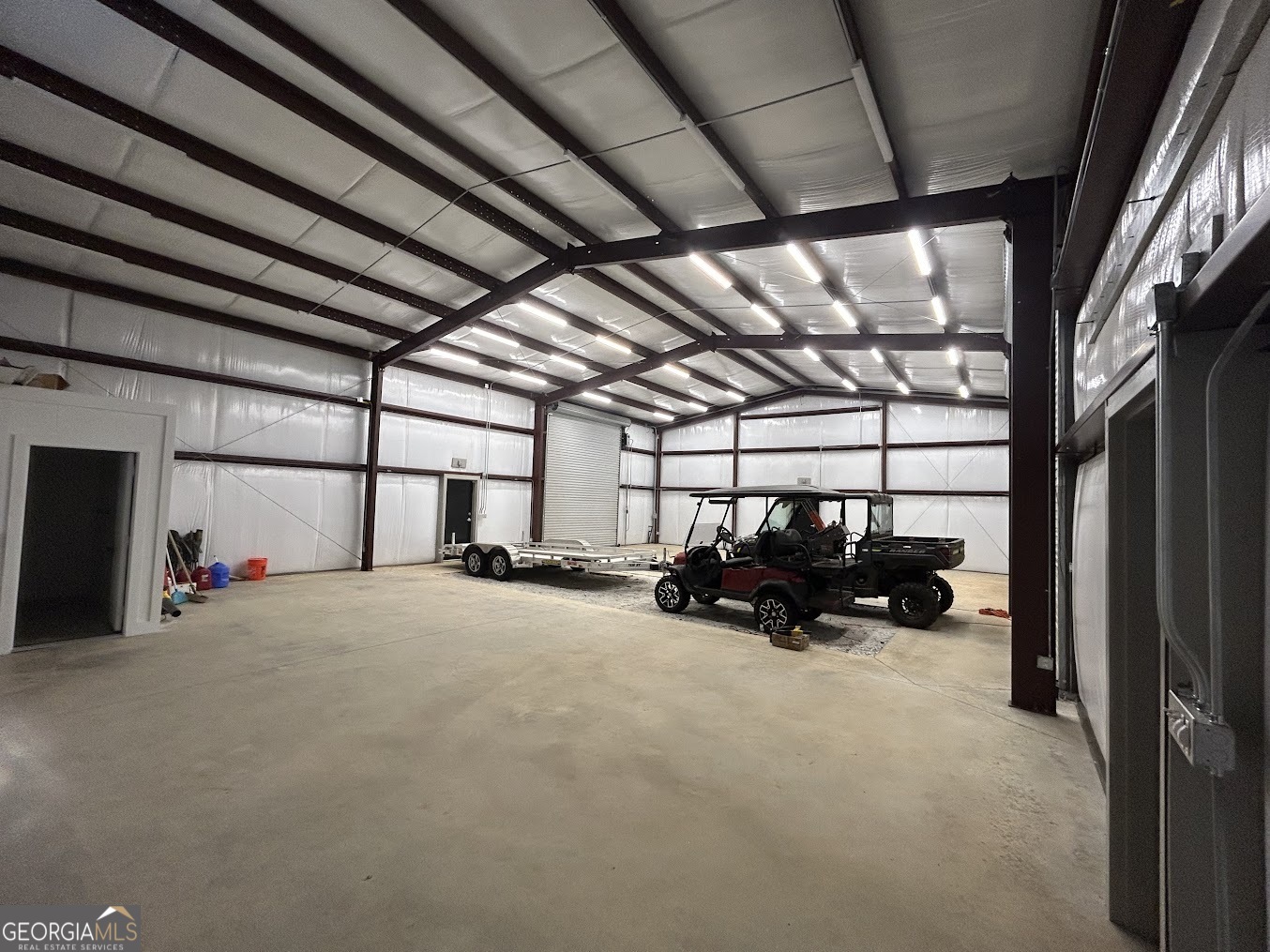 85 Blackjack Mountain Road Bowdon, GA 30108 - Photo 26 of 32 a view of a garage