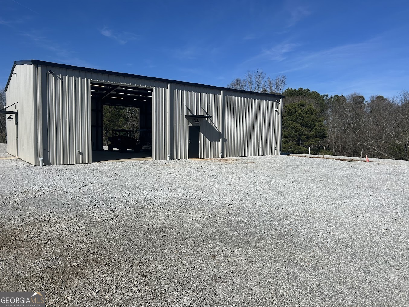 85 Blackjack Mountain Road Bowdon, GA 30108 - Photo 31 of 32 a view of a house with a outdoor space